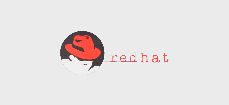 The Shadowman icon with the text redhat beside it in a red type-writer-style font.