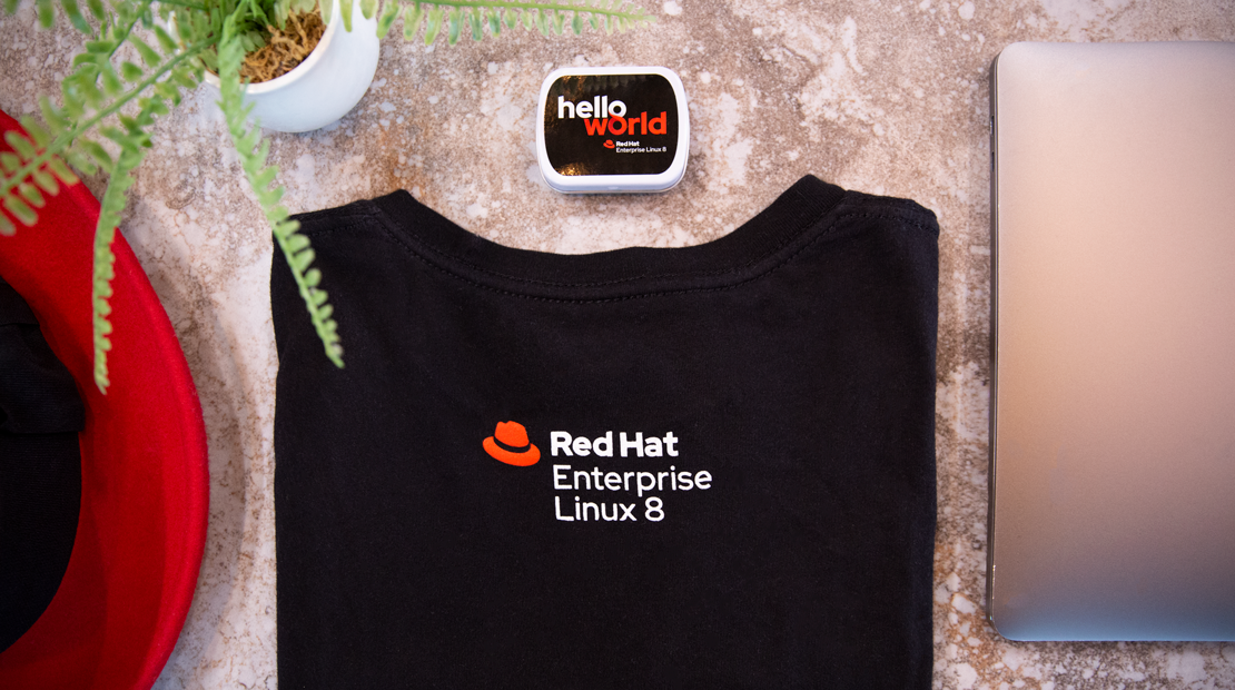 Photograph of a collection of Red Hat Enterprise Linux merchandise.